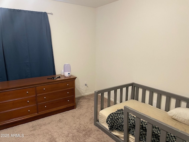 bedroom with light colored carpet