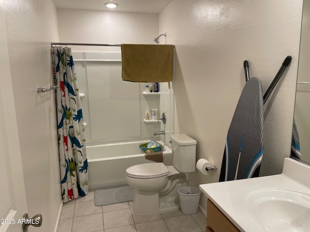 full bathroom featuring tile patterned flooring, vanity, shower / tub combo, and toilet