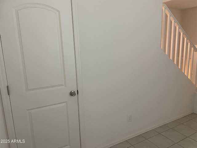 interior space featuring tile patterned flooring