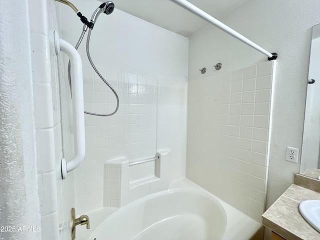 bathroom with shower / tub combination and vanity