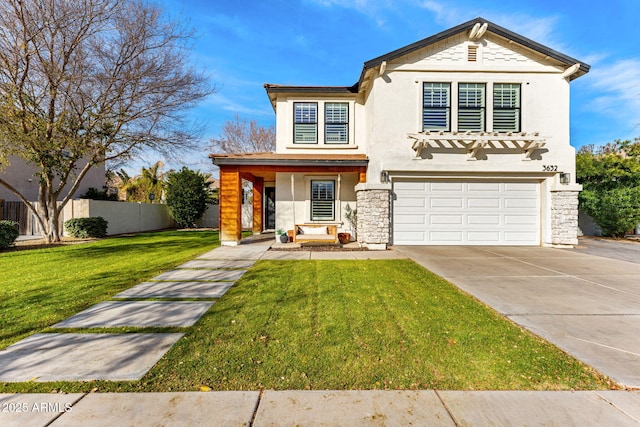 view of front of house featuring a garage, a porch, and a front yard