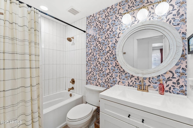 full bathroom featuring vanity, toilet, and shower / tub combo with curtain