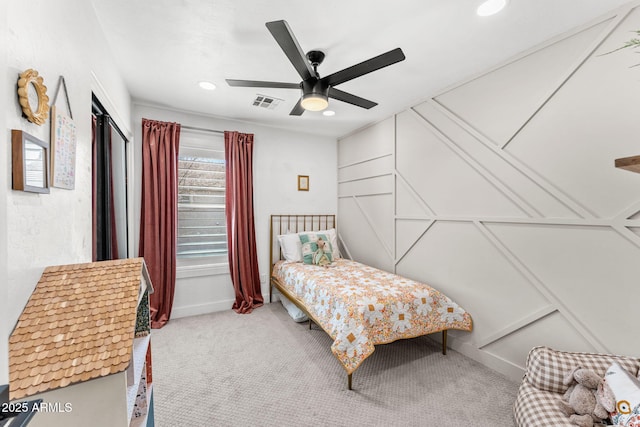 carpeted bedroom featuring ceiling fan