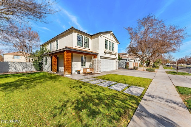 view of front of property featuring a garage and a front lawn