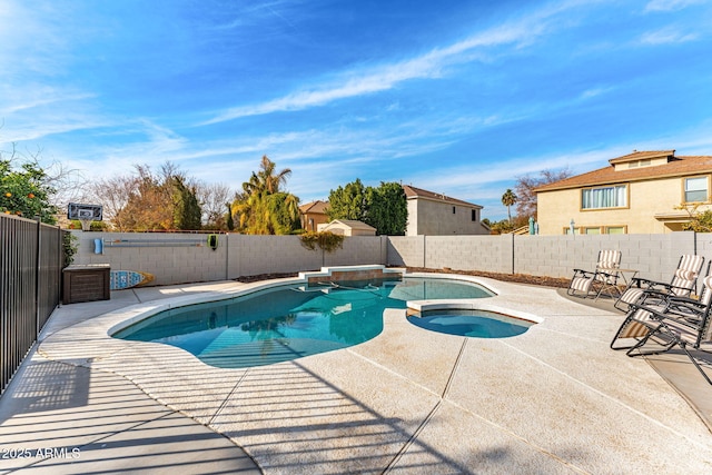 view of pool featuring an in ground hot tub