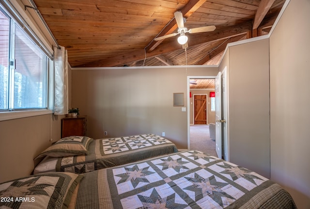 1423 Geode Dr, Forest Lakes, AZ 85931 - carpeted bedroom with vaulted ceiling with beams, a ceiling fan, and wood ceiling