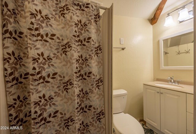 1423 Geode Dr, Forest Lakes, AZ 85931 - full bathroom featuring toilet, walk in shower, vanity, and beam ceiling