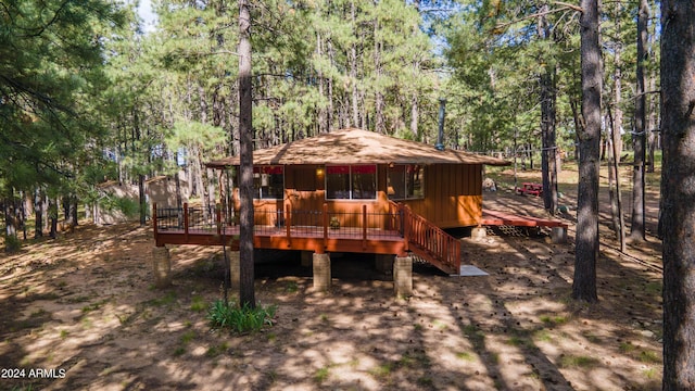 1423 Geode Dr, Forest Lakes, AZ 85931 - view of play area with a wooded view and a deck