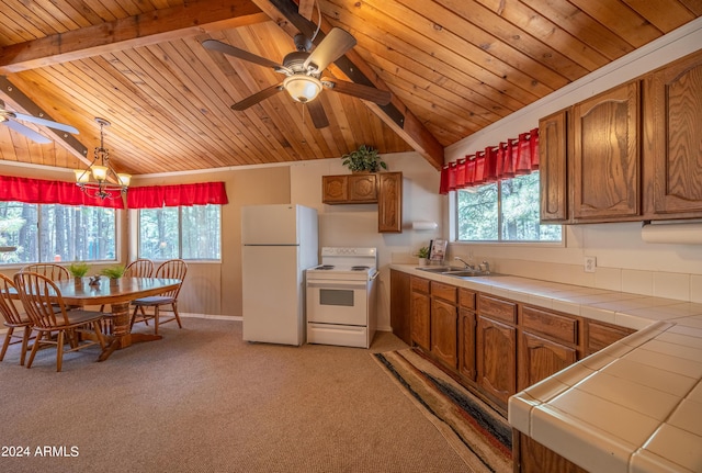 1423 Geode Dr, Forest Lakes, AZ 85931 - kitchen featuring white appliances, tile countertops, a sink, and a ceiling fan