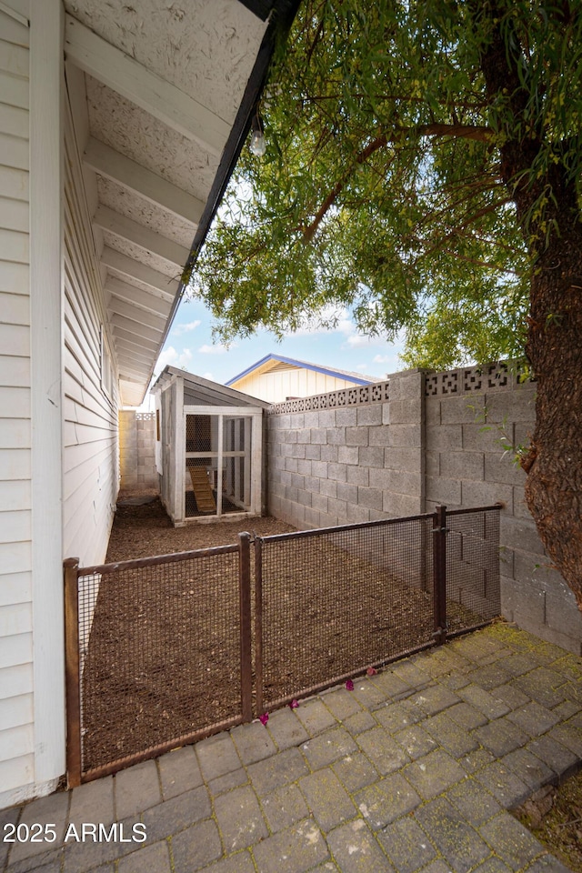 view of patio / terrace with an outdoor structure