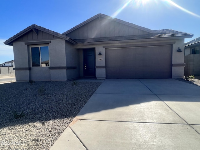 single story home with a garage