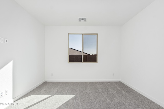 empty room with carpet floors