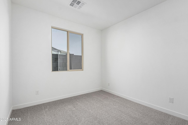 unfurnished room featuring carpet floors