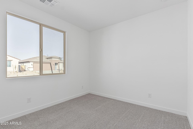 view of carpeted spare room