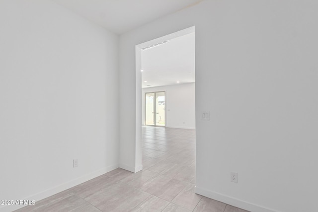 view of tiled spare room