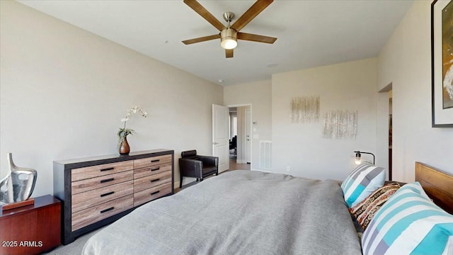 carpeted bedroom featuring a ceiling fan