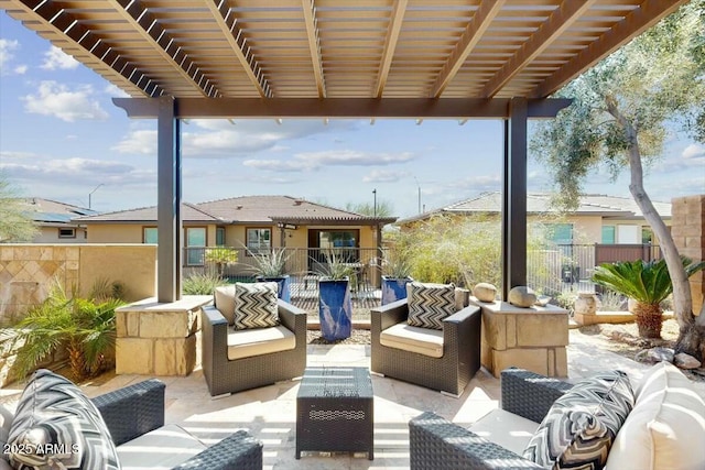 view of patio featuring outdoor lounge area, fence, and a pergola