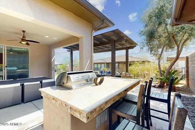 view of patio / terrace with a ceiling fan, an outdoor kitchen, area for grilling, and a pergola
