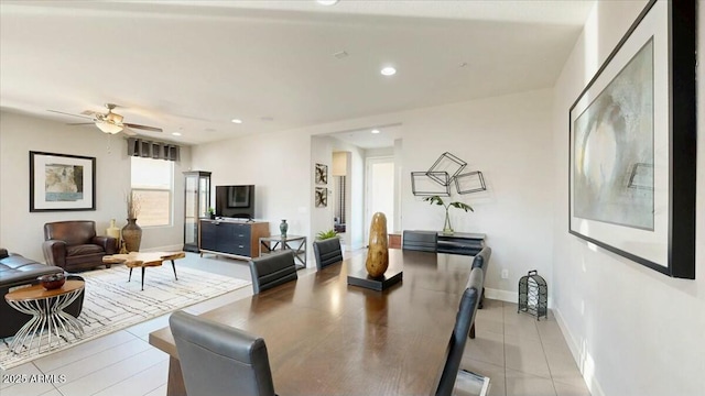 dining area with baseboards, ceiling fan, and recessed lighting