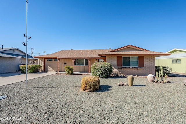 ranch-style home with a garage