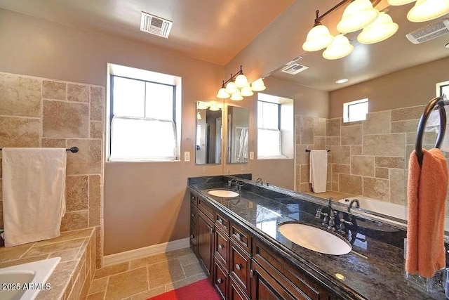 3804 E Camelback Rd, Phoenix, AZ 85018 - bathroom featuring a bath, double vanity, and walk in shower