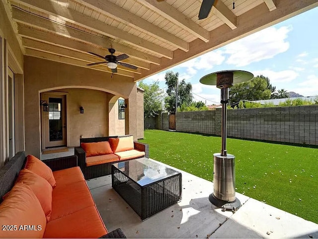 3804 E Camelback Rd, Phoenix, AZ 85018 - fenced backyard featuring a ceiling fan, an outdoor hangout area, and a patio
