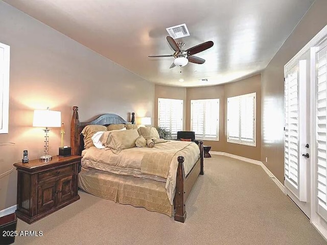 3804 E Camelback Rd, Phoenix, AZ 85018 - carpeted bedroom with multiple windows and a ceiling fan