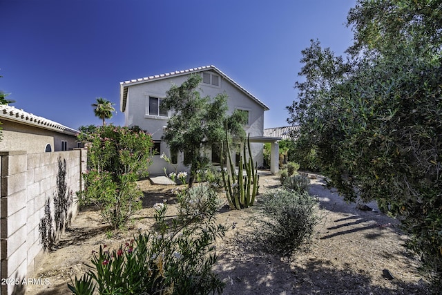 4530 E Desert Wind Dr, Phoenix, AZ 85044 - rear view of house featuring stucco siding