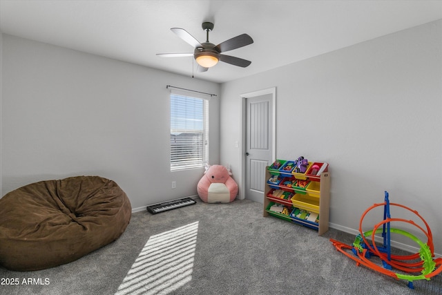 rec room with ceiling fan and carpet floors