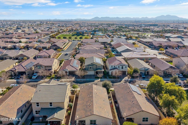 drone / aerial view featuring a mountain view