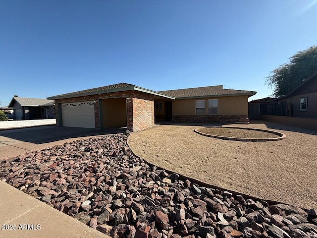 ranch-style home with a garage