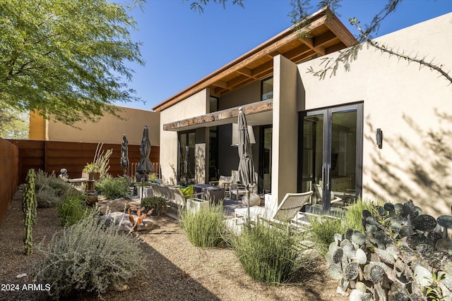 6525 E Cave Creek Rd Unit 6, Cave Creek, AZ 85331 - rear view of house featuring a patio, stucco siding, and fence