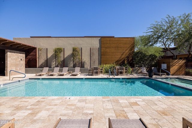 view of pool with a patio