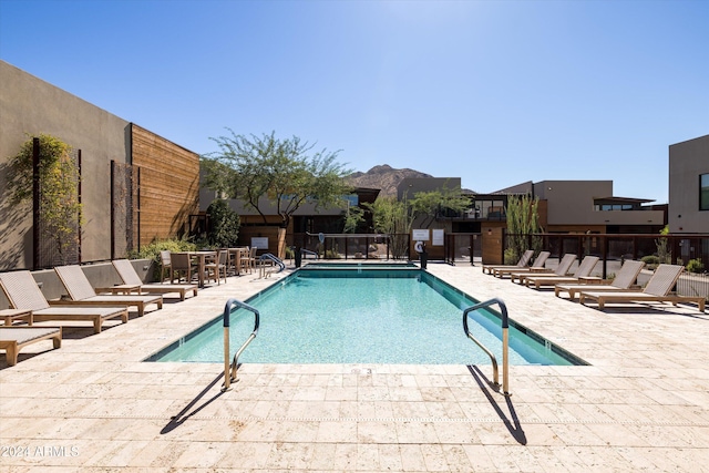 view of pool featuring a patio area