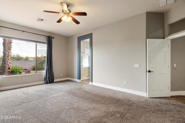 2761 W Via Calabria, Phoenix, AZ 85086 - spare room featuring ceiling fan, light carpet, and baseboards