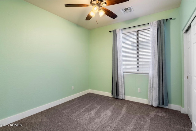 2761 W Via Calabria, Phoenix, AZ 85086 - unfurnished room featuring ceiling fan, dark carpet, and baseboards