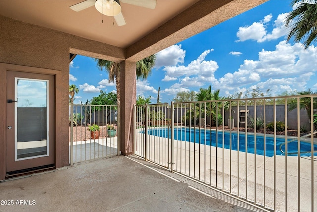 2761 W Via Calabria, Phoenix, AZ 85086 - view of swimming pool featuring a fenced backyard, ceiling fan, and a patio