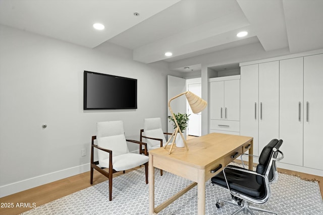 office area featuring light wood finished floors, recessed lighting, and baseboards