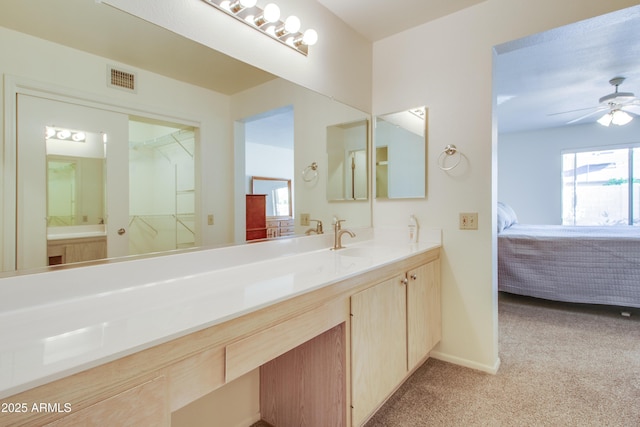 bathroom with vanity and ceiling fan