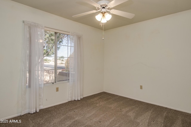 carpeted empty room with ceiling fan