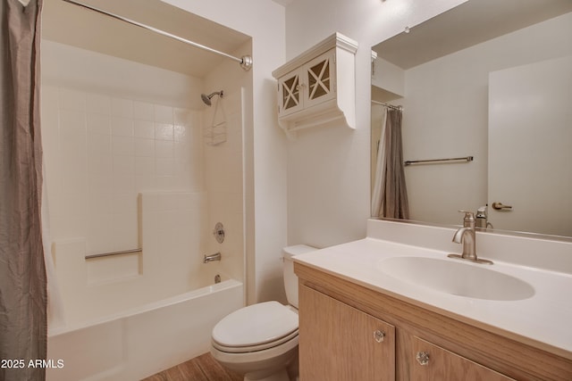 full bathroom with shower / bathtub combination with curtain, vanity, and toilet