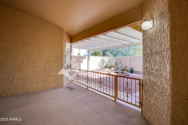 view of patio with a balcony