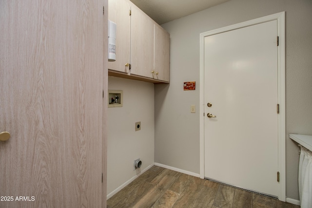 laundry room featuring cabinets, washer hookup, dark hardwood / wood-style floors, and hookup for an electric dryer