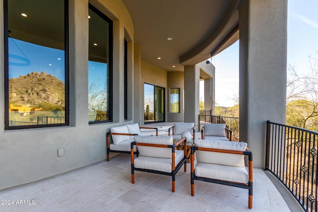 balcony featuring a mountain view