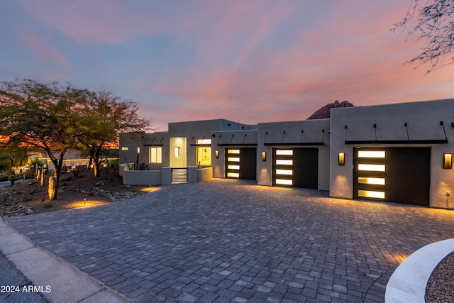 view of front of property featuring a garage