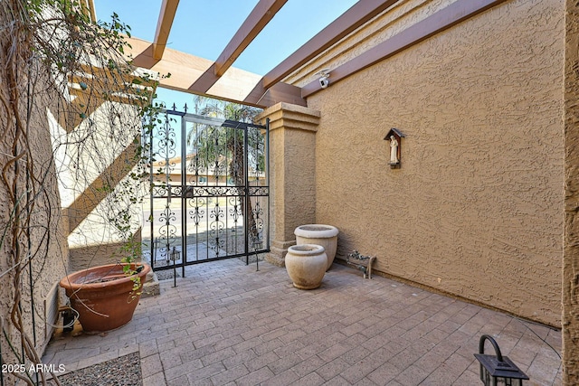 view of patio featuring a pergola