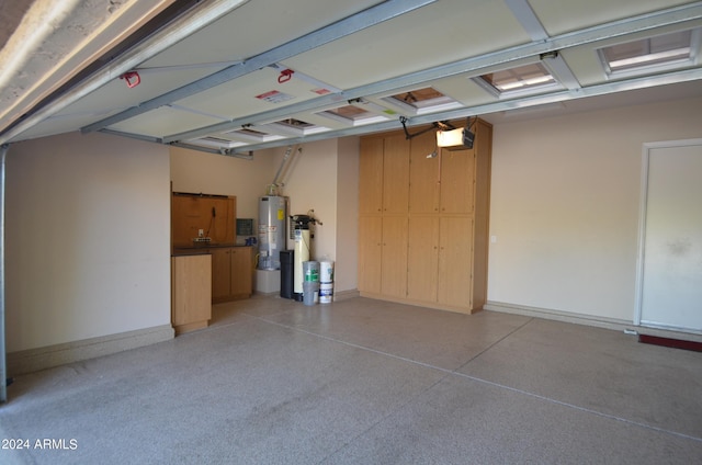 garage featuring a garage door opener, gas water heater, and baseboards