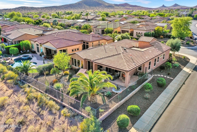 drone / aerial view with a mountain view and a residential view