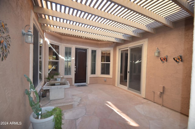 view of patio / terrace featuring a pergola