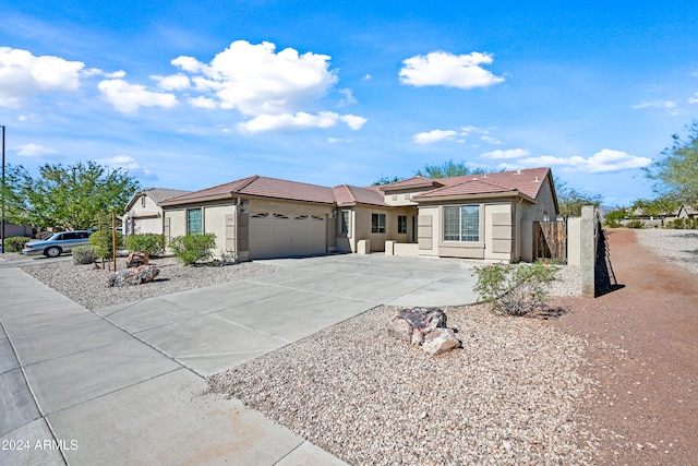 single story home featuring a garage